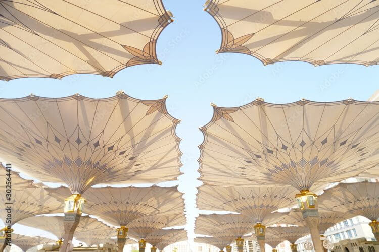 Big umbrella structure of al masjid al nabawi from the holy land and beautiful building structure madinah saudi arabia