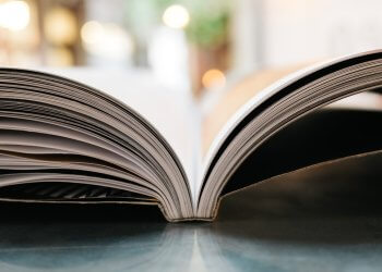 bokeh photography of open book